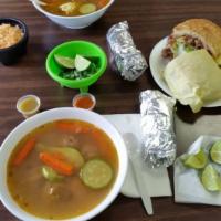 Torta · Meat, beans, mayo, lettuce, tomato, avocado, onion and cilantro.