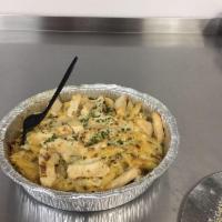 Green Chile Chicken Alfredo Penne. · PENNE PASTA BAKED IN ALFREDO SAUCE AND
TOPPED WITH GRILLED CHICKEN BREAST,
GREEN CHILI, CRUM...