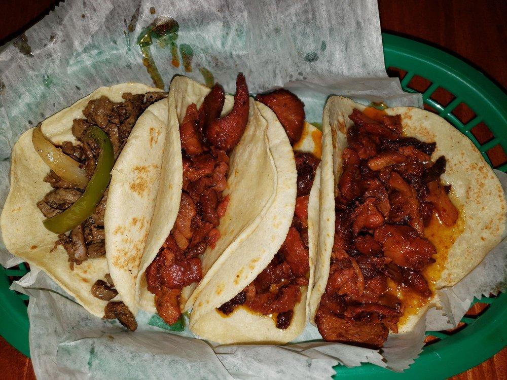 Carne Asada Taco · Grilled steak with onions.