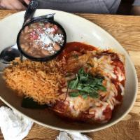 Short Rib Enchiladas · Braised short rib, toasted gaujillo salsa de enchiladas, melted queso chihahua. Served with ...