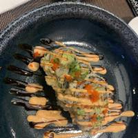 Godzilla Roll · 6 pieces. Spicy tuna, avocado roll, deep-fried with masago, scallion, spicy mayo and eel sau...