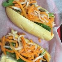 Grilled Chicken Banh Mi · Lemongrass grilled chicken with scallion oil. Served with homemade aioli, cilantro, cucumber...