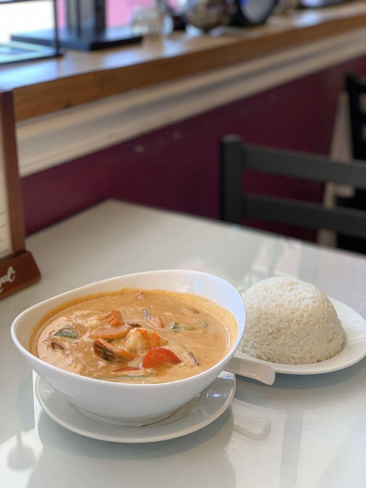 Massaman Curry · Southern Thai style curry sauce with a semi-sweet and spicy flavour mixed with coconut milk, accompanied with potatoes, onions, bell pepper and peanuts.