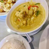 Yellow Curry · *Gluten Free* Choice of meat cooked in sweet yellow curry paste and coconut milk, stewed wit...