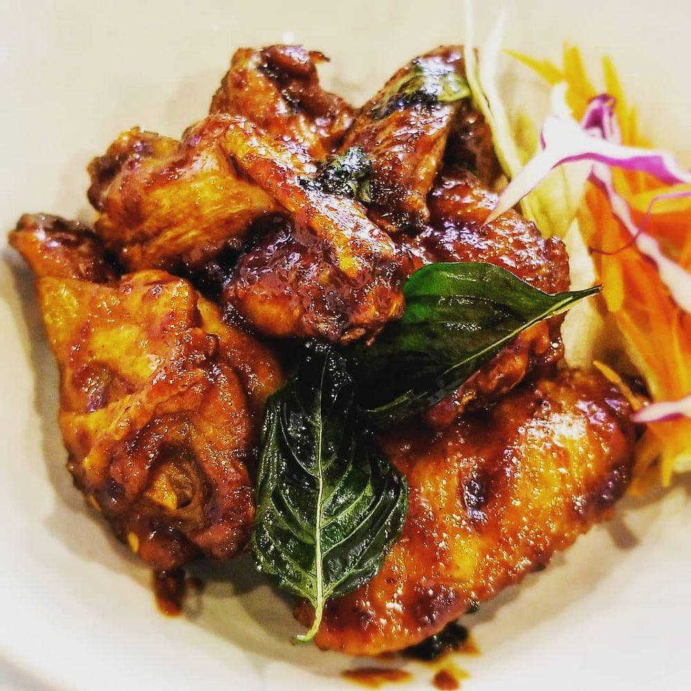Spicy Basil Wings · 6 Jumbo wings glazed with Thai chili paste, garlic, and fresh basil gives you a perfect sweet and spicy combination. Its finger-licking good!!

(contains: shellfish products)
