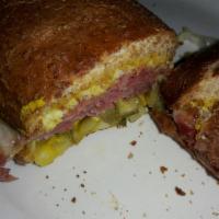 Pastrami Sandwich · Extra lean. Includes lettuce, tomato, pickles, onions, mustard, mayonnaise and cheese. Serve...
