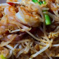 Pad Thai · Rice noodles, peanuts, egg and bean sprouts.
