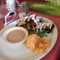 Flautas · Three deep fried corn tortillas with your choice of meat topped with lettuce, drizzled sour ...