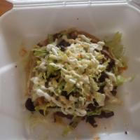 Sopes · Thick corn dough tortilla topped with your choice of meat, beans, lettuce, tomatoes, cheese,...