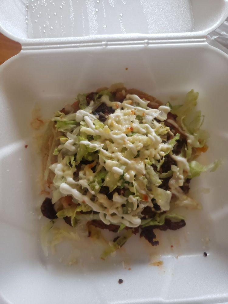 Sopes · Thick corn dough tortilla topped with your choice of meat, beans, lettuce, tomatoes, cheese, & sour cream. 