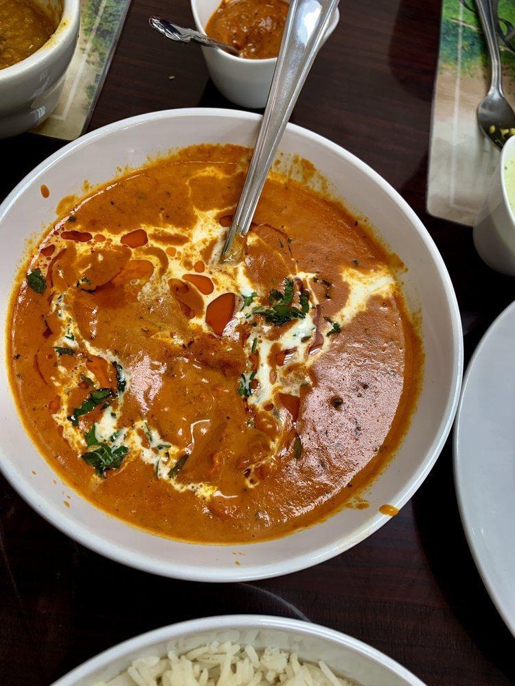 Butter Chicken Masala · Chunks of chicken cooked in a smooth, buttery and creamy tomato based gravy.