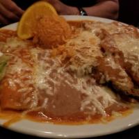 Chiles Rellenos · 2 stuffed chiles. Comes with tortillas, rice, beans, and sour cream.
