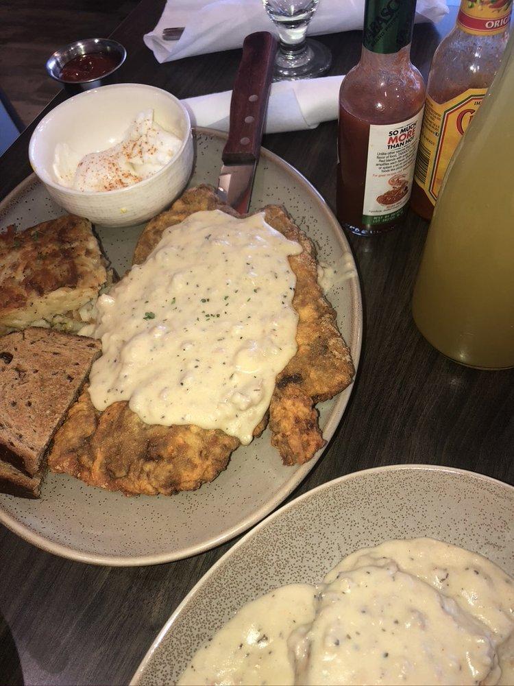 Chicken Fried Steak · Classic hand breaded and fried steak with sausage gravy, eggs, hash browns, and toast.