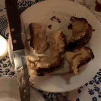 Roasted Garlic Bruschetta · Roasted garlic, olive oil and Parmigiano.