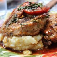 Roasted Chicken · With wild fennel seeds, rosemary, roasted tomatoes and mashed potatoes.