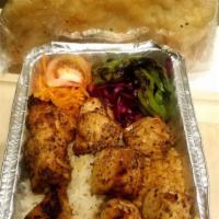 Chicken Shish Kebab · Specially marinated chicken breast cubes. Entrées are served with pickled red cabbage, shred...