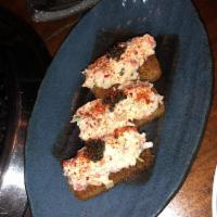 Lobster Roll · Crispy Brioche, Sriracha Aioli, Caviar, Tarragon 
