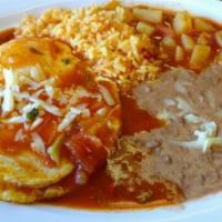 Huevos Rancheros · 2 over easy eggs on a crispy tortilla topped with ranchera sauce and Monterrey jack cheese. ...