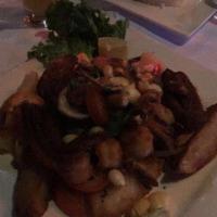 Jalea Especial · A peruvian party dish: lightly fried fish fillet, shrimp and shellfish with a light lime dre...