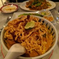 Khao Soi · Northern style curry noodle soup with chicken, pickle, red onion, bean sprouts, dried chili ...
