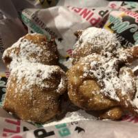 Fried Oreos · Our signature dessert. Oreos, dipped in sweet batter and fried, then dusted with powdered su...