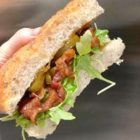 Bacon Brie Panini Lunch · Focaccia, brie, fig jam, arugula and applewood smoked bacon. On Artisan bread. Served with a...