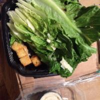 Caesar Salad · Crisp chopped romaine, creamy Caesar dressing, shaved Parmesan, housemade croutons. Vegetari...