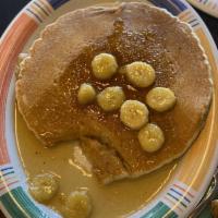 Jack Johnson Banana Walnut Pancakes with Eggs & Protein · Our fluffy buttermilk pancakes with toasted walnuts cooked right into the batter, then toppe...