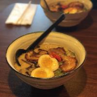 Tonkotsu Ramen · Pork broth with pork chashu, kikurage, green onion, menma, and soft boiled egg.