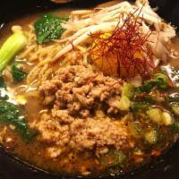 Spicy Umami Miso Ramen · Chicken and miso broth with ground pork, green onion, bean sprout, bok choy, garlic oil, and...