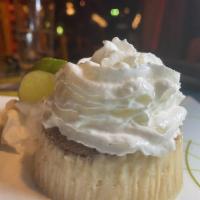 Homemade Key Lime Pie · Graham cracker crust and topped with homemade whipped cream.