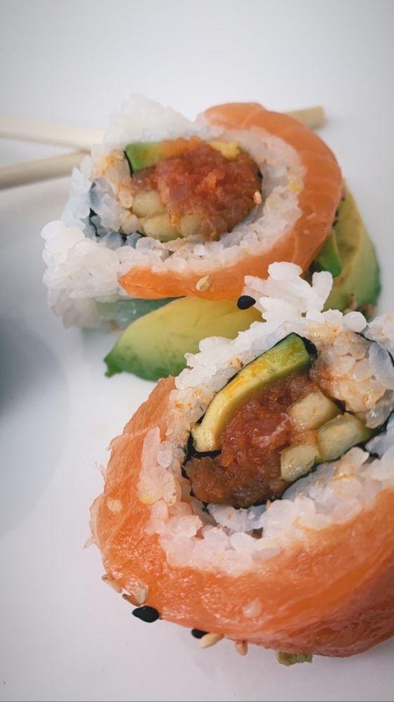 Rainbow Roll · Ca. roll with tuna, yellowtail, whitefish, salmon, albacore and avocado on top.
