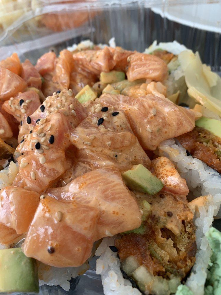 Key West Roll · Spicy tuna ,green chili tempura inside salmon and tuna spicy mayo, hot sauce, Special sauce , avocado and fish eggs on top.