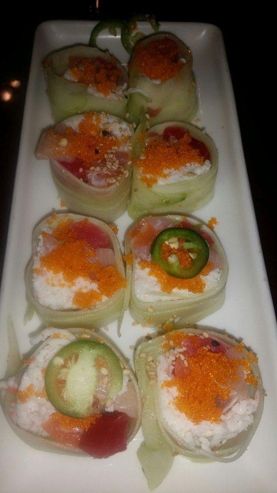 Cucumber Special Roll · Tuna, salmon, albacore, yellowtail and crab wrapped in a thin cucumber skin with spicy mustard dressing, fish eggs and sliced jalapenos on top.