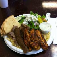 Victor's Chicken and Gyros Plate · Marinated grilled chicken tenderloins and gyros. Served with pita, rice, Greek salad and tza...