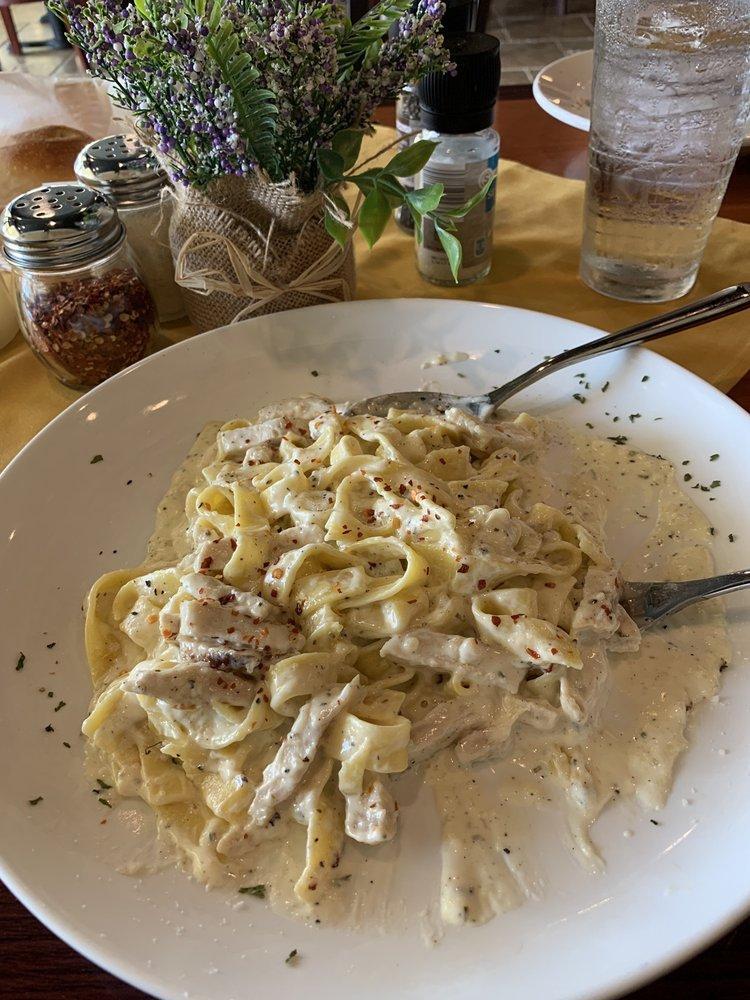 Chicken Fettuccine Alfredo · Fettuccini pasta with Alfredo sauce served with grilled chicken finished with Parmesan cheese.