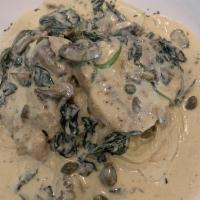 Chicken Florentine · Sauteed chicken breast with fresh mushrooms, spinach, and white wine creamy sauce, served ov...
