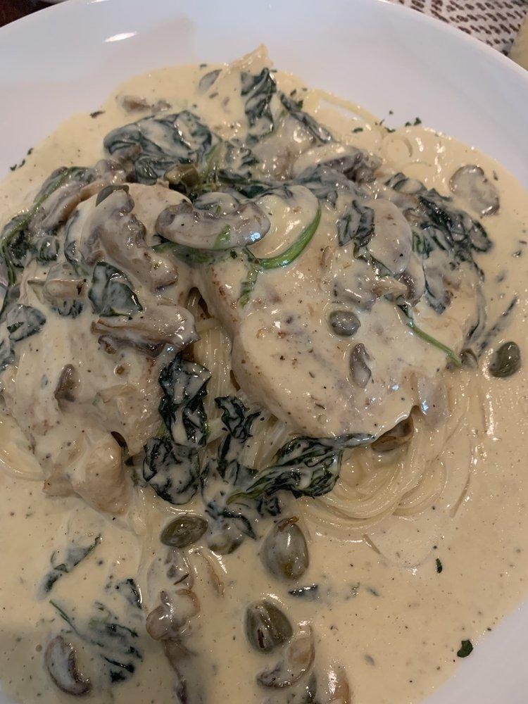 Chicken Florentine · Sauteed chicken breast with fresh mushrooms, spinach, and white wine creamy sauce, served over spaghettini.