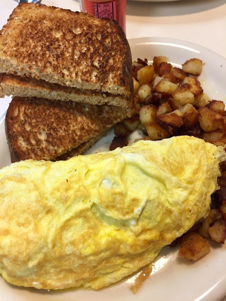 Omelettes · 3 large eggs, home fries, and toast. Include 2 fillings.