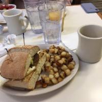 Baja Ciabatta Sandwich · 2 eggs, fried hard or white only, turkey sausage, cheddar cheese and sliced avocado with hom...