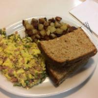 Western Eggs · Eggs, ham, onion, green peppers with home fries and toast.