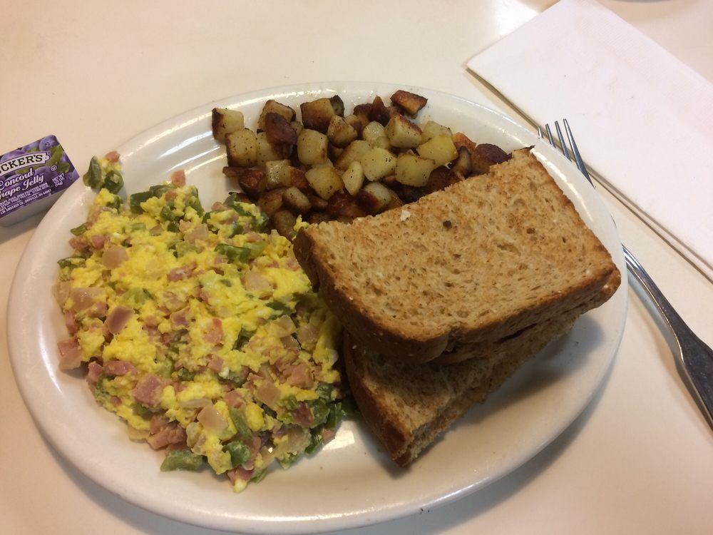 Western Eggs · Eggs, ham, onion, green peppers with home fries and toast.