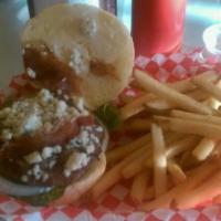 Babes Blue Burger · Crumbled blue cheese melted on grilled onions. Served with lettuce, tomato, pickle and house...