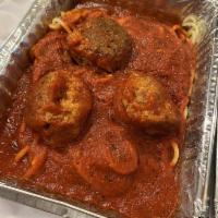 Spaghetti with Meatballs · Served with garlic bread.