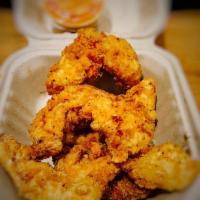 Chicken Fingers · Served with dipping sauce.