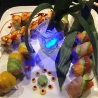 Snow Mountain Maki · Shrimp tempura topped with snow crab mayo and a layer of avocado and mango.