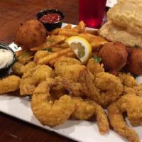 Fried Shrimp Platter · Served with French fries, hush puppies, 2 fried onion rings, French bread, cocktail and tart...