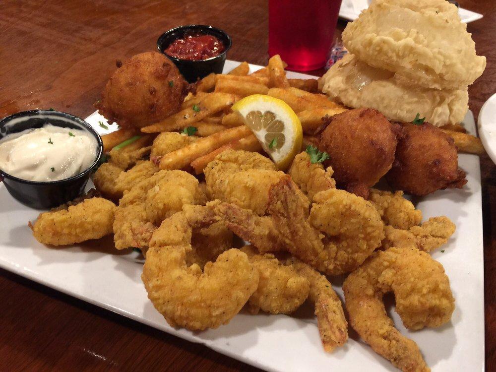 Fried Shrimp Platter · Served with French fries, hush puppies, 2 fried onion rings, French bread, cocktail and tartar sauce.
