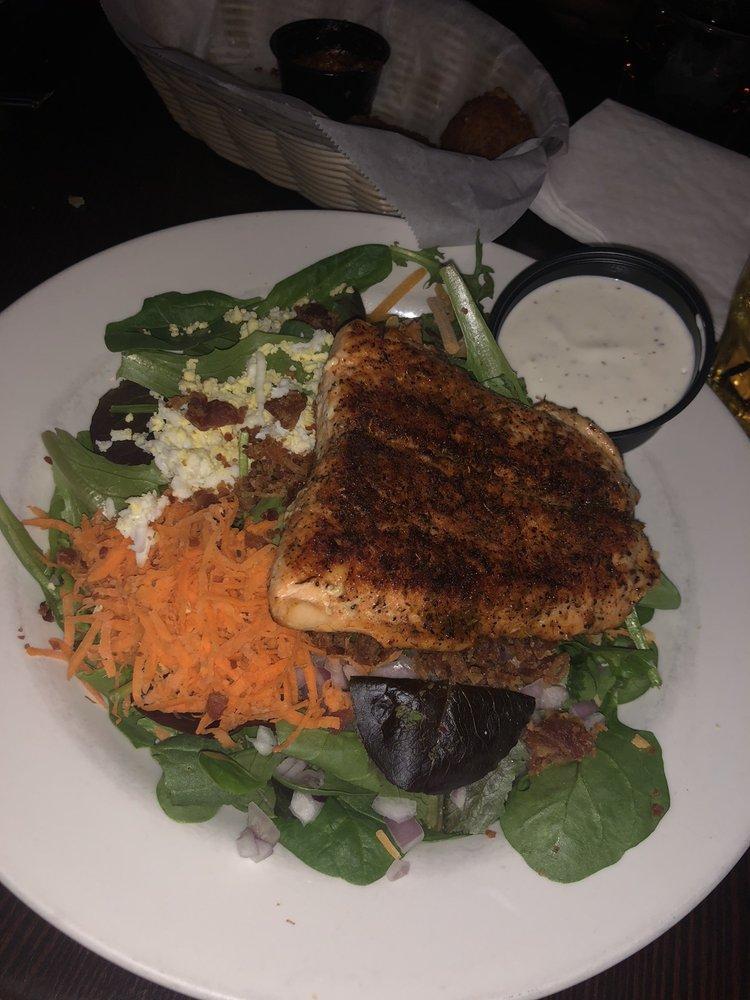 Blackened Salmon · Freshly cut and served over a bed of wild rice with a side of steamed broccoli.