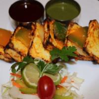 Paneer Tikka Masala · Cottage cheese. A spicy twist to the butter masala, but with onions, bell peppers and our ti...